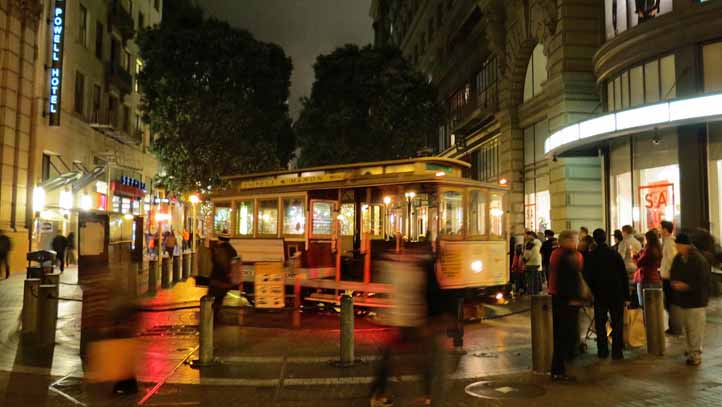 MUNI cable car on Main Street turntable at night